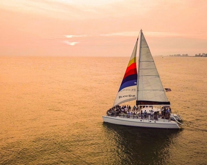 Sunset and Dolphin Watch Sailing Cruise on Island Time II Catamaran