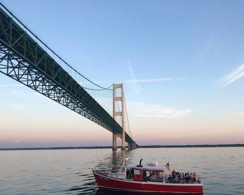 Cruise Under the Mackinac Bridge at Evening