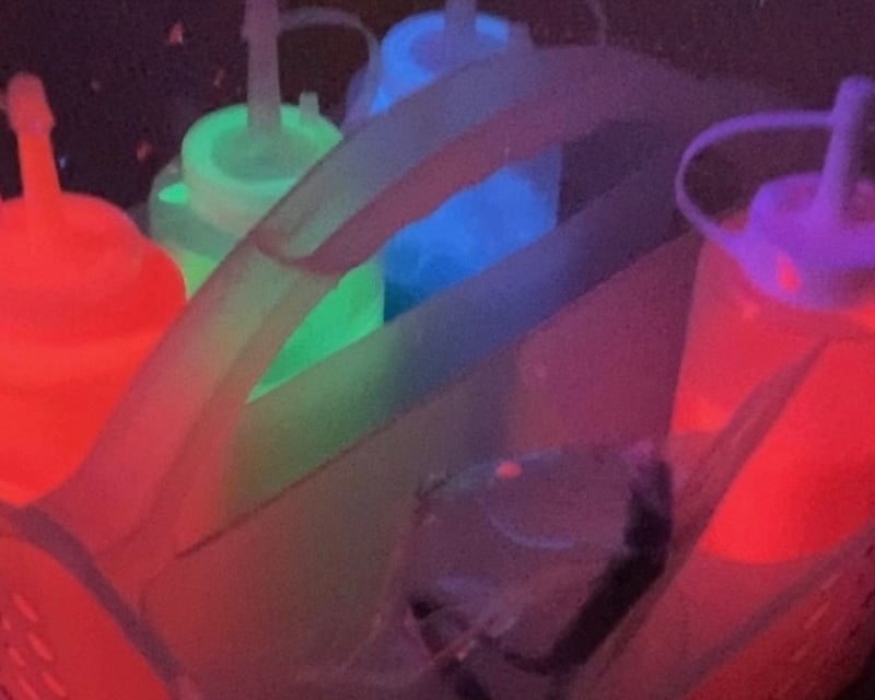 Black Light Neon Paint Splatter Room in Front Royal