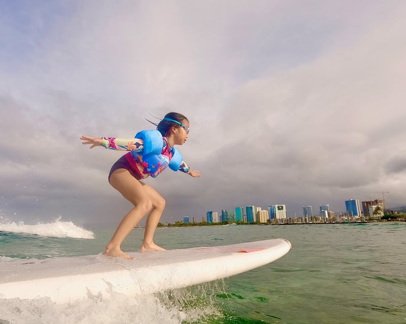 Kids Learn to Surf Hawaiian Waves in Waikiki