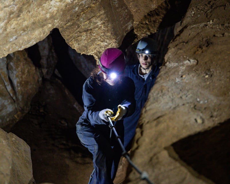 Take the Gauntlet Caving Tour at Fountain Cave
