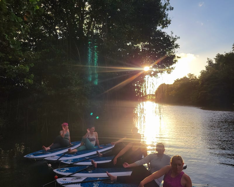 Sunset Paddleboard Yoga on the Anahulu River in Haleiwa