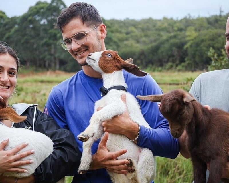 Baby Goat Cuddling & Petting Zoo Farm Visit in Hilo