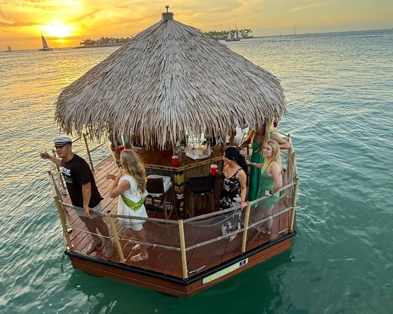 Sunset Tiki Boat Cruise Past Mallory Square in Key West