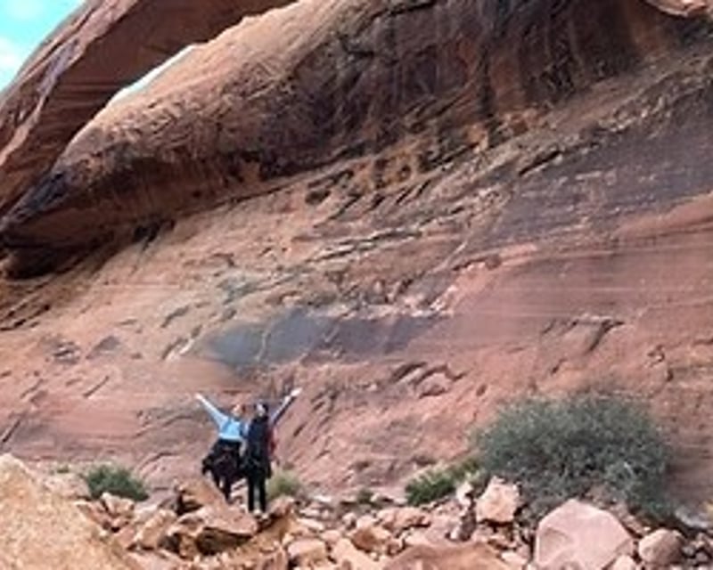 Longbow Arch Hike in Moab with Dinosaur Tracks & Petroglyphs