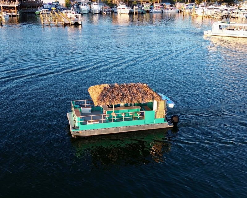 Cruise Destin Harbor on a Private Sunset Tiki Pontoon