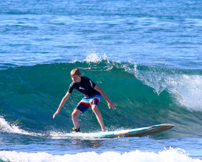 Enjoy a North Shore Sunset Surf Lesson & BBQ