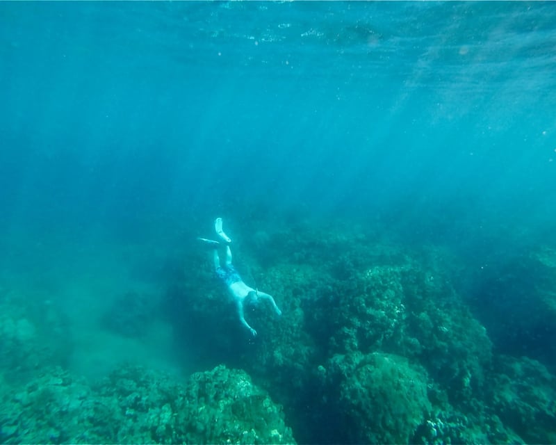 Private Black Sand Beach Hike & Snorkel near Waikoloa